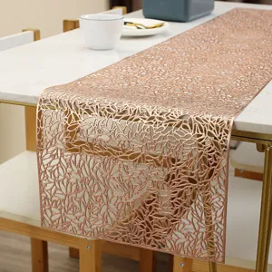 Gold stamped PVC hollow table runner, floral placemat for dining table and tea set decoration.