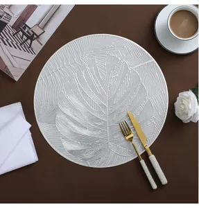 Nordic style round PVC gold-stamping monstera leaf placemat, washable heat insulation pad.