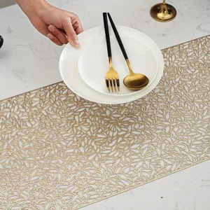 Gold PVC hollow table runner, elegant floral design heat-insulating non-slip mat for dining table.
