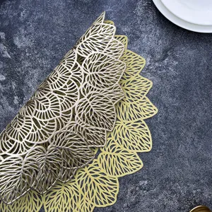 Tovaglietta PVC foglia traforata stile nordico bronzatura oro tappeto tavola decoro vista principale