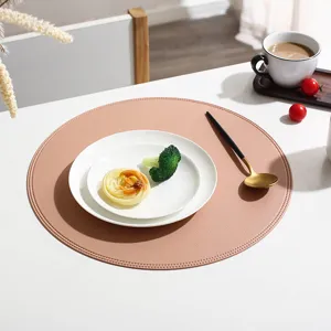 Round PU leather placemat, waterproof, oil-proof and heat-insulating western dining table decor.