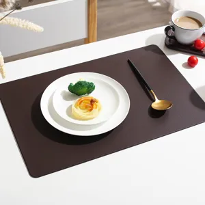 Brown leather placemat detail view, elegant minimalist dining table pad for modern home decor