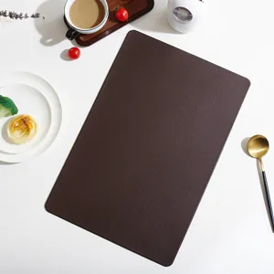 Premium rectangular brown leather placemat, stylish heat insulation table mat for modern dining decor.