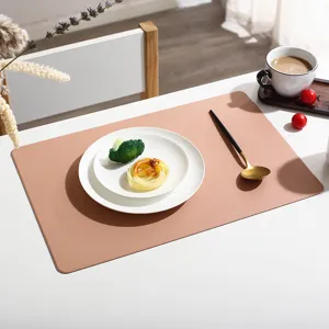 Minimalist solid color rectangular leather placemat, luxury heat insulation table pad for dining.