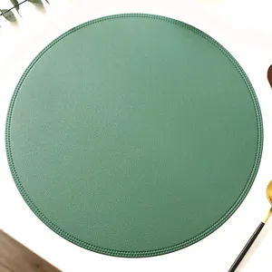 Round leather placemat waterproof oil proof heat insulation mat for the dining table.