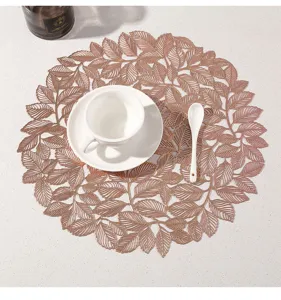 Tovaglietta rotonda a foglia traforata tappetino metallico isolamento termico decorazione elegante.