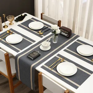 Set di tovagliette e runner da tavola intrecciati rettangolari, elegante motivo a spina di pesce.