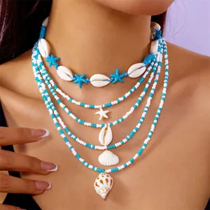 Bohemian multi-layer shell necklace set with blue rice beads and starfish charms for women.