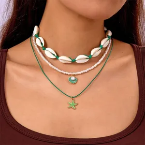 Bohemian layered necklace set with cowrie shells pearl beads and starfish pendant