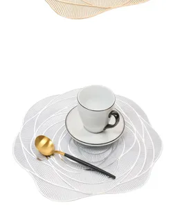 Exquisite hollow PVC placemat with elegant rose design, perfect Nordic style table decor.