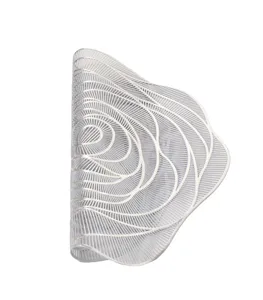 Silver hollow PVC placemat, waterproof heat insulation table mat for dining room decor.