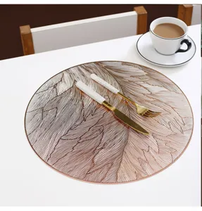 Ronde gouden veren placemat PVC hittebestendig tafelmat elegante eetkamer decoratie details