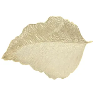 Gold leaf shaped placemat, waterproof and washable table mat for modern home kitchen dining.