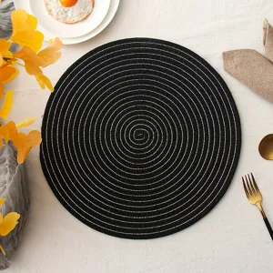 Ronde zwarte gevlochten placemat detail, katoenen draad warmte-isolatie tafelmat.