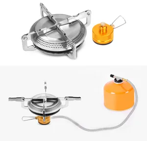Portable outdoor camping gas stove with folding burner and gas canister adapter hose.