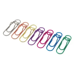 Creative metal paper clip notebook pen holder multi-functional stationery accessory.