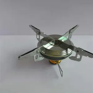Mini portable camping gas stove detail, lightweight foldable outdoor burner for hiking and cooking.