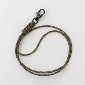 Camouflage paracord lanyard with black metal clasp, durable handmade neck strap for phone or keys.