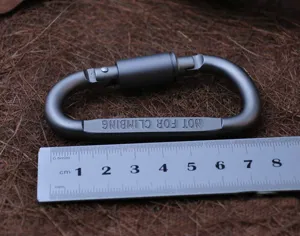 Aluminum alloy locking carabiner detail view, lightweight outdoor camping gear size display.