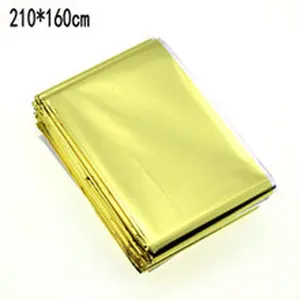 Outdoor emergency thermal survival blanket, gold and silver dual-color rescue foil sheet.
