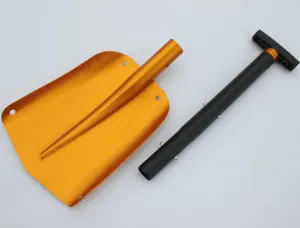 Aluminum outdoor folding snow shovel detail shot, portable car emergency tool part display.