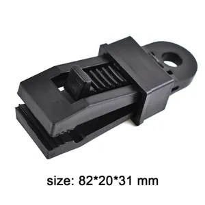 Black plastic tent clip for outdoor camping, heavy duty tarp clamp and awning fixing tool.