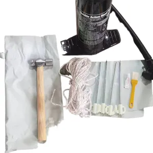 Tent accessory set detail showing hand pump hammer ropes pegs and repair glue for camping