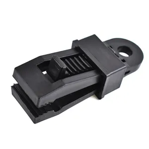Black plastic tent clip detail view, durable tarp clamp for outdoor canopy and camping gear.