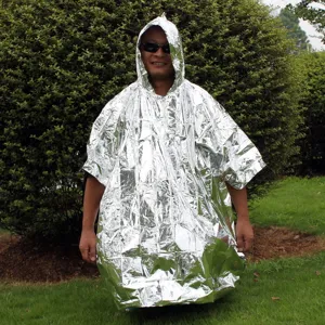 Emergency thermal raincoat detail view, silver reflective rescue poncho for outdoor survival.