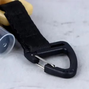 Black carabiner clip and strap detail for portable outdoor travel spray bottle accessory.