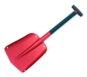 Aluminum alloy snow shovel detail shot, featuring red blade, black handle and portable design.