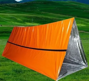 Tente de survie d'urgence extérieure avec extérieur orange imperméable et intérieur argenté.