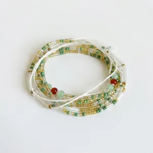 Macro view of multi-layer bohemian beaded waist chain with colorful seed beads