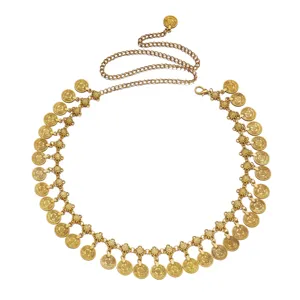 Close-up of golden coin tassel body chain for ethnic belly dance styling.