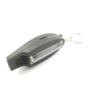 4-in-1 outdoor survival whistle with compass thermometer magnifier and handy keychain tool.