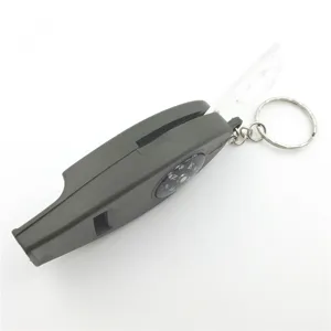 Outdoor 4-in-1 survival whistle with compass, magnifier, and keychain in dark grey color.
