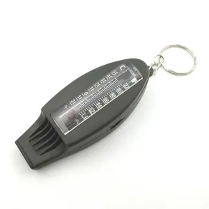 Outdoor 4-in-1 survival whistle with integrated thermometer, compass and portable keychain design.