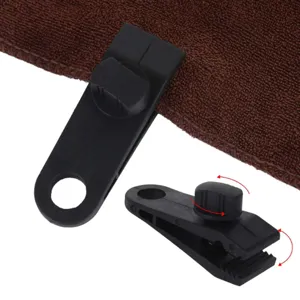 Pince de tente de camping en plastique noir avec bouton reglable pour bache exterieure.