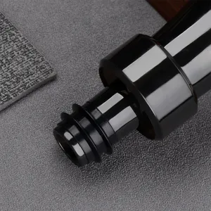Black wine pourer aerator spout for home kitchen bar use, durable food-grade stopper tool.
