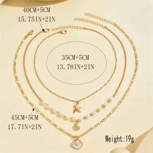 Detail view of multilayered starfish and shell necklace set with length measurements