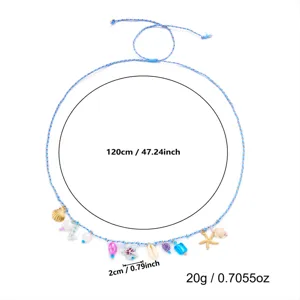 Detailed close-up of a bohemian beach waist chain featuring shells and starfish charms