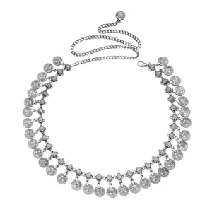Detailed view of a Bohemian silver coin tassel waist chain for belly dance and dress decoration