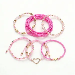 10-teiliges rosa Perlenarmband-Set mit goldenen Herzanhängern für den Valentinstag
