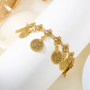 Detailed macro shot of vintage gold coin fringed belly dance ethnic waist body chain