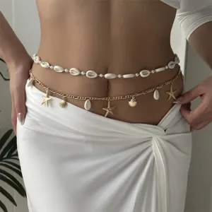 Detail shot of bohemian beach waist chain with shell and starfish charms