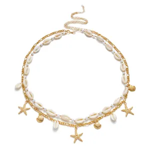 Bohemian multi-layer waist chain with pearls, starfish pendants and natural shells.