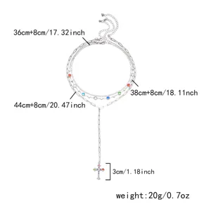 Detailed dimensions for the three-layer cross necklace set with colorful rhinestones.