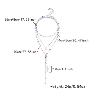 Detailed dimensions of a multi-layer colorful rhinestone cross necklace in silver finish