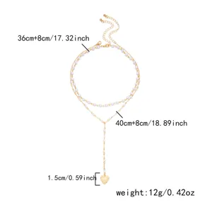 Detailed measurements of double-layer pearl necklace with golden heart pendant