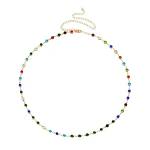 Bohemian style gold-tone waist chain with colorful rhinestone accents for beach wear